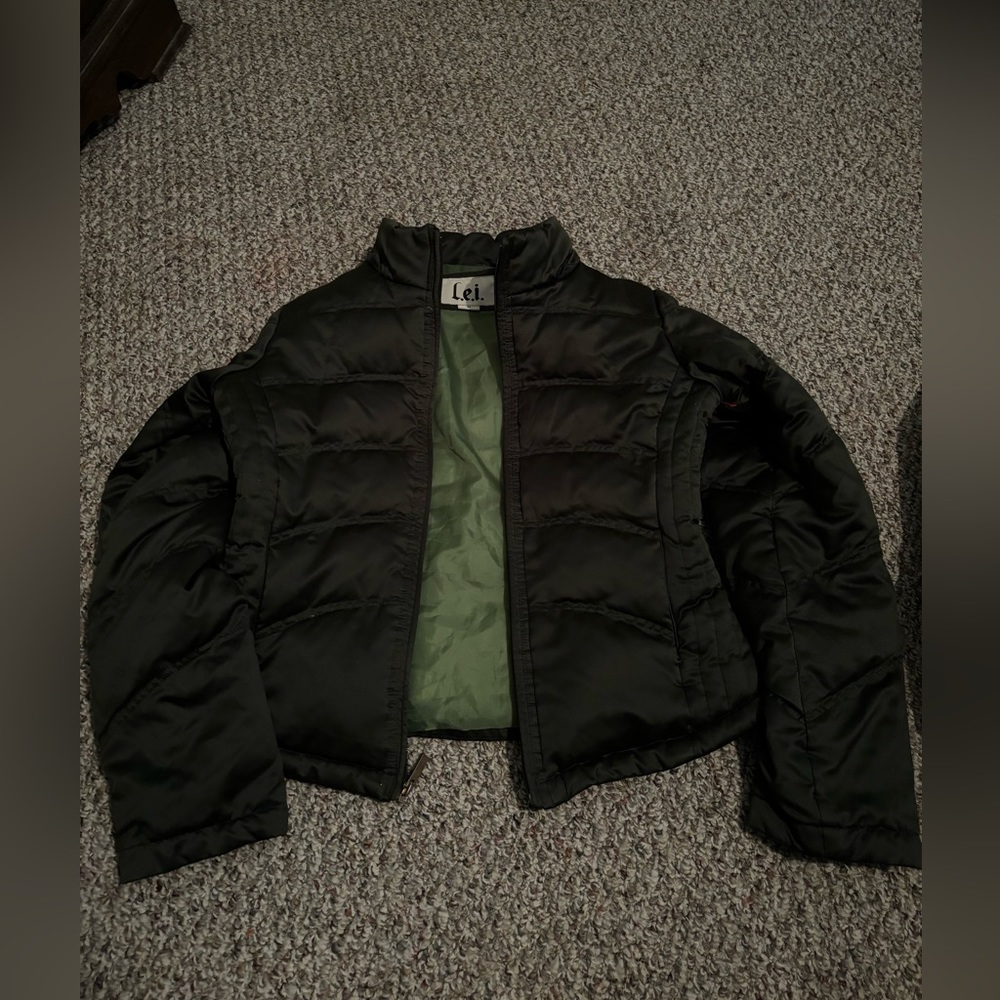 Green puffer coat